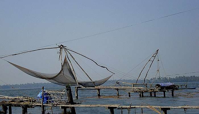 This dramatic and breathtaking shot of the famous Chinese Fishing Nets unveils them as a symbol of Kumbalangi.