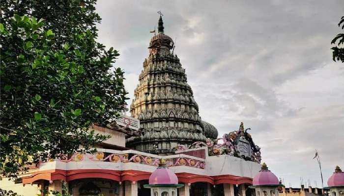 Colourful decorations and lights at Naulakha Temple during a Jain festival.