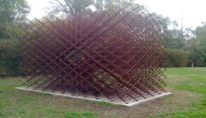 Craft cows grazing grass at the sculpture park in Heide Museum of Modern Art