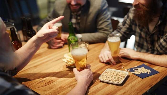 View of guest enjoying beer at the pub