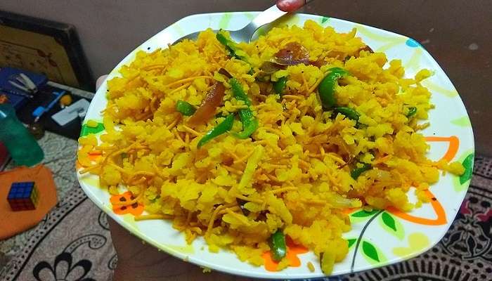 Poha is a light, fluffy rice dish, usually served with a dash of lemon juice