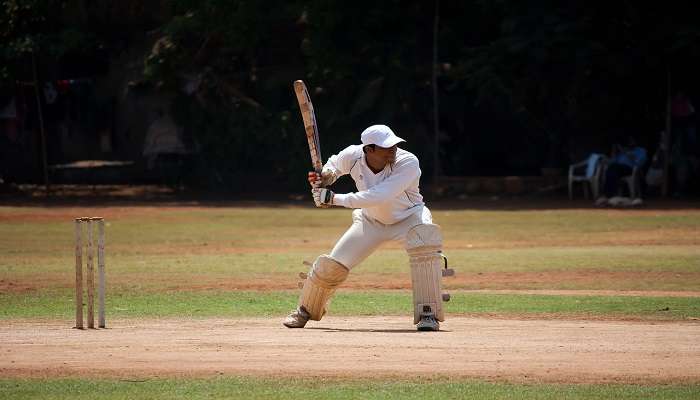 Batsman playing cricket in a stadium