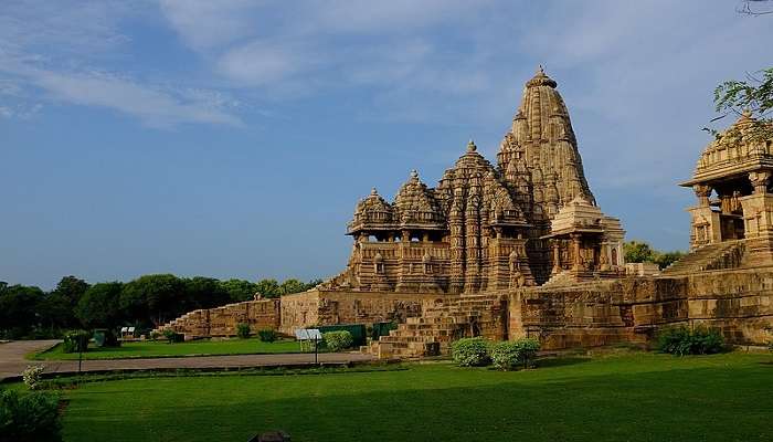 A beautiful picture with a garden Kandariya Mahadeva Temple.