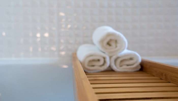 Hand towels in a tray in a room