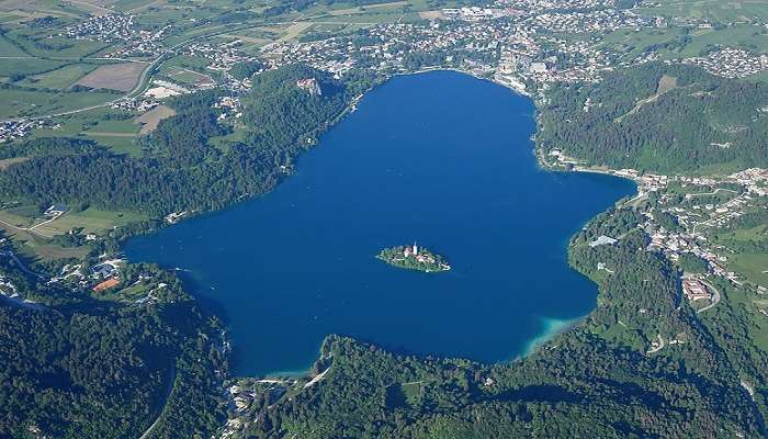 Aerial view of Lake Bled nestled in stunning natural scenery