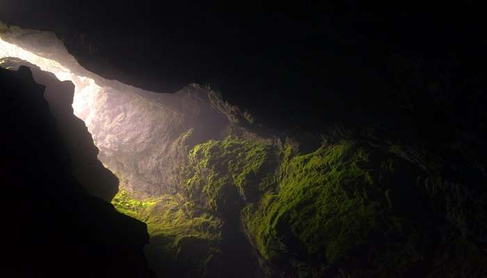 Ancient Kalaroos Caves nestled in the lush greenery of Lolab Valley,