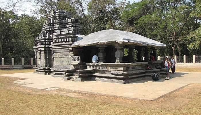 Ancient stone Mahadev Temple seated within dense forests of Tambdi Surla