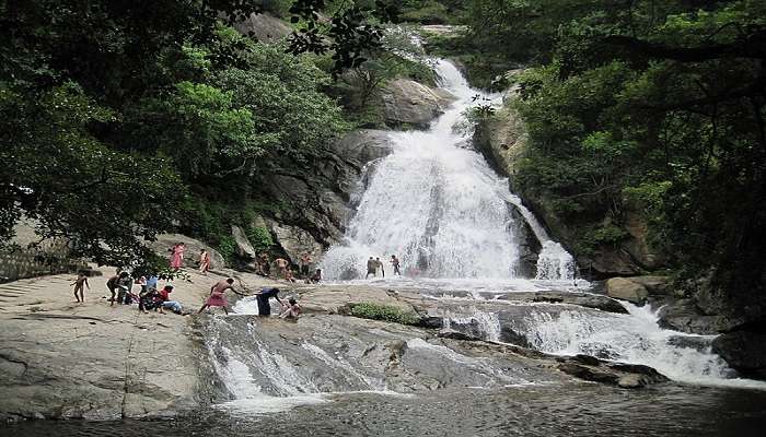 People enjoying the waterfall