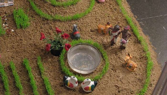 Navratri Celebration Alt text: Intricate decorations and cultural program during the Navaratri.