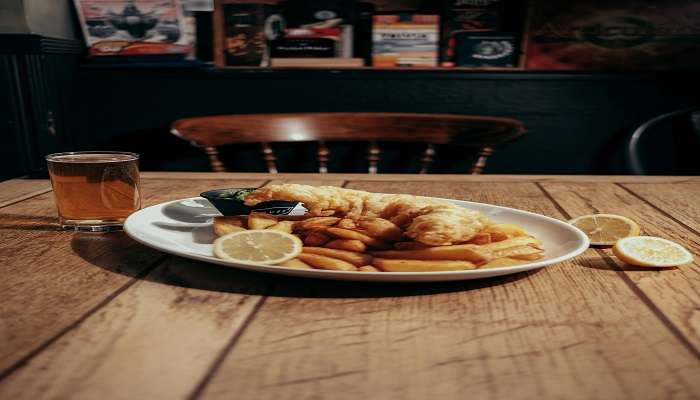 A photo of fish and chips served in a local cafe. 