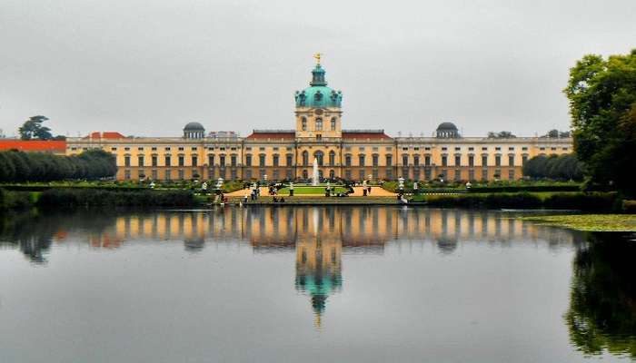 Charlottenburg Palace and lush park under clear skies