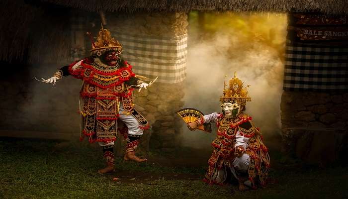 A group of beautiful Balinese dancers against an Asian travel background, representing the cultural richness of Bali that you can experience at Peliatan Palace. 