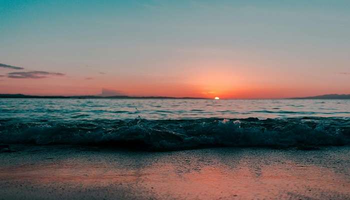 Sunset at the beach of Goa near the Zuari River.