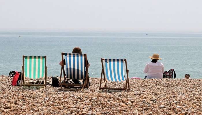 Visitors swimming and Sunbathing.