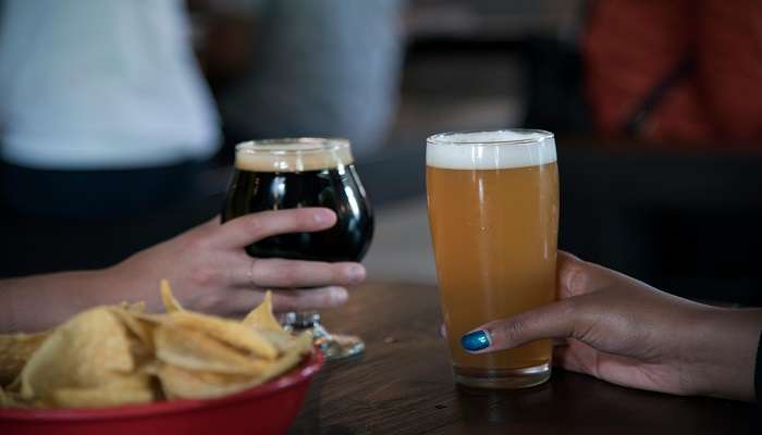 Drinks and snacks on table at a Pub