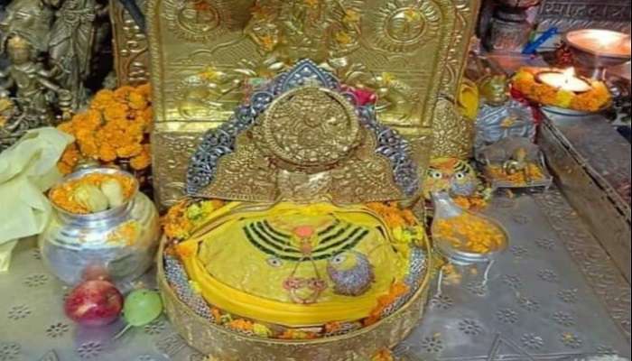 Aarti taking place at the Nagarkot Ki Rani temple.