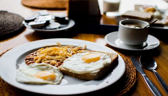 A beans and fried eggs dish for breakfast