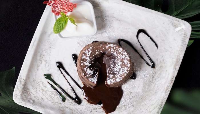 Enjoying a mouth-watering chocolate lava cake.