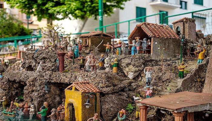 Display of small and colourful figurines portraying the Village of craftsmen in Vietri Sul Mare