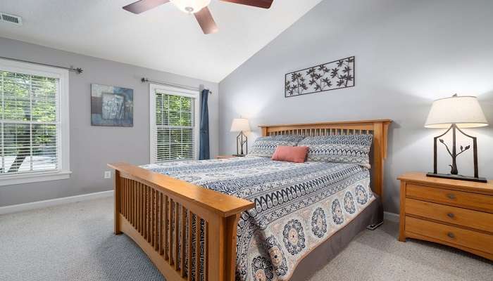 A king-size bed in a hotel room