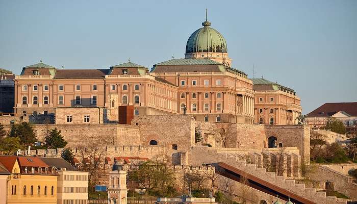 Sunrise over Buda Castle creates a magical morning view