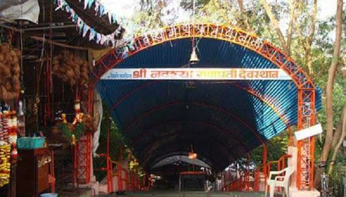 The deity of Lord Ganesh is shown at the temple as a simple black stone