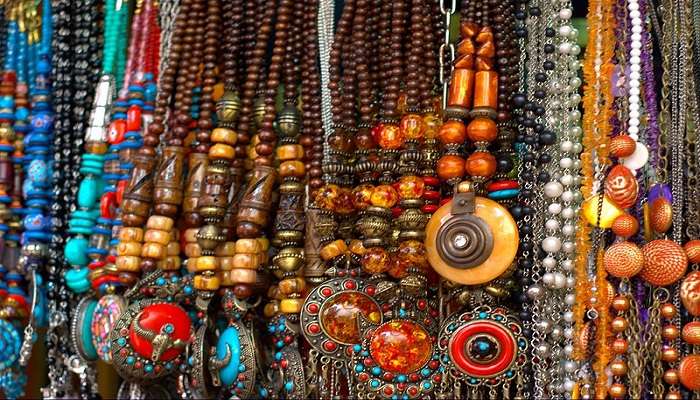 Colourful handmade jewellery displayed at a Tibetan market