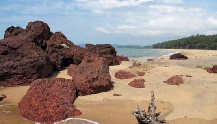 Quiet and serene Galgibaga Beach with clear blue waters and golden sands.