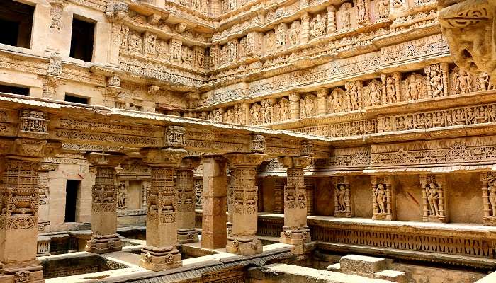 The intricately designed stepwell showcasing detailed sculptures. 