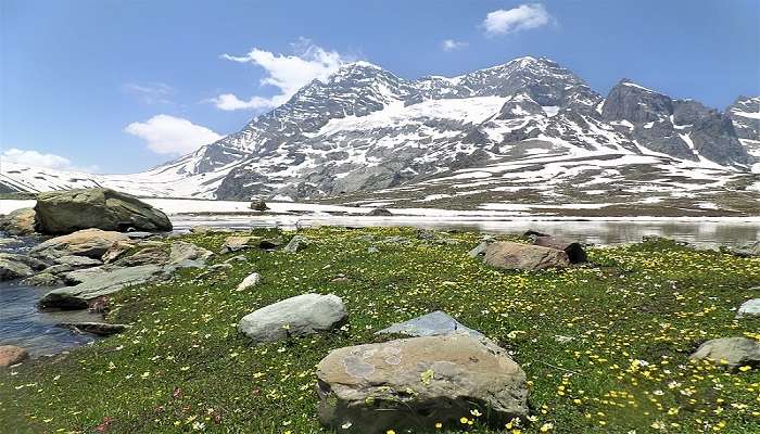 Snowy Harmukh Peak towering above the surrounding landscape of the Himalayas in Naranag.