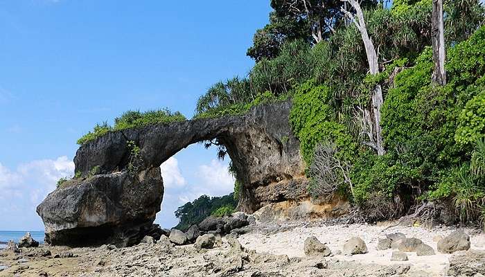 During low tides, a natural rock formation near Laxmanpur Beach unveils the Howrah Bridge