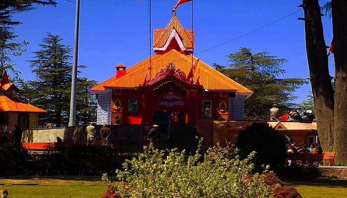 Jakhu Temple with the tall statue of Lord Hanuman near the lakkar bazaar.