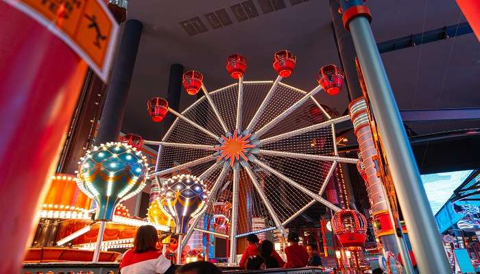 Indoor Play arena of Harbor Land consisting of Ferris Wheel ad rollercoaster 