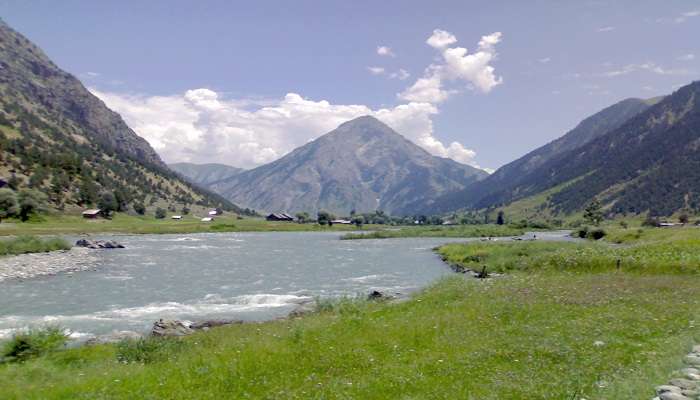 Kishanganga River, with rapid waters, forms the backdrop of a narrow mountain gorge. 