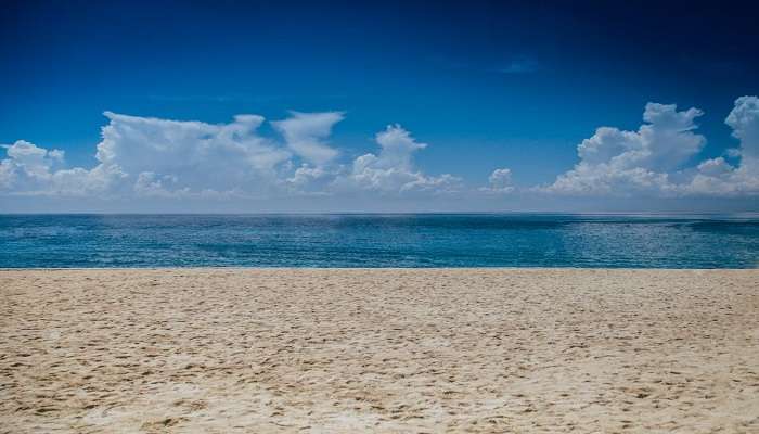 Golden sands and tranquil waves at Padinharekara Beach in Ponnani