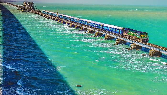  A picturesque view of the Pamban Bridge, connecting Rameswaram Island to mainland India over the sea.