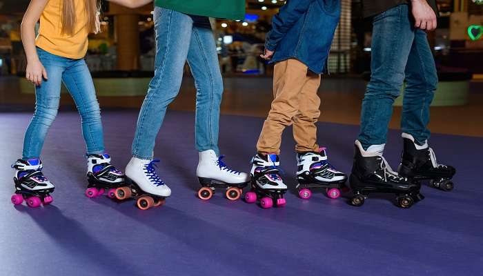 Partial view of parents and kids skating on RollerLandr 