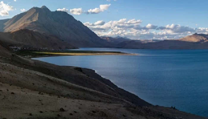 The lake of the Tso Moriri Wetland is surrounded by rugged mountains 