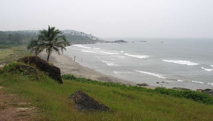 It is a well-known beach in Goa with red cliffs