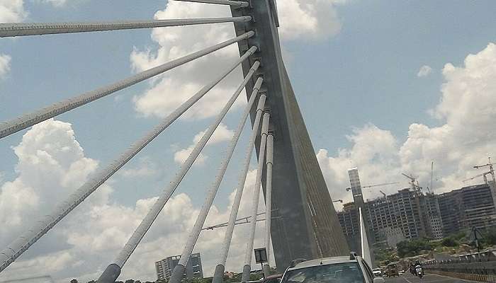 Walk along the pathway at durgam cheruvu cable bridge. 