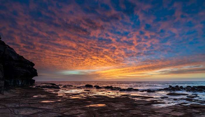 Witness the gorgeous sunrise at Sitapur Beach at Neil Island