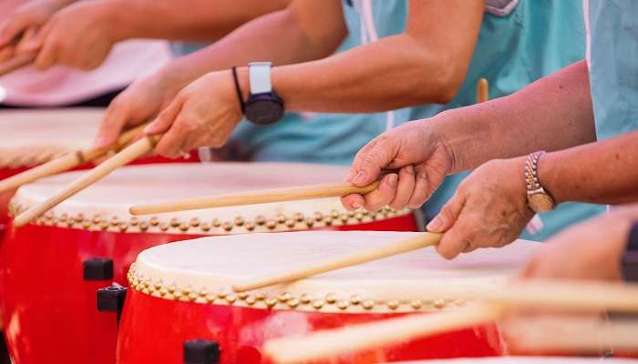 When done in local community centres, cultural festivals, or special events at temples