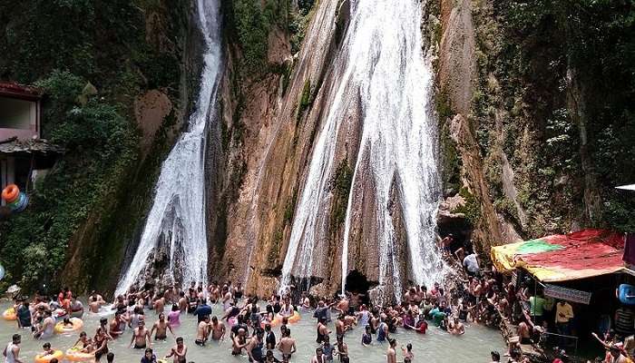 : People are enjoying at Kempty Falls in Mussoorie