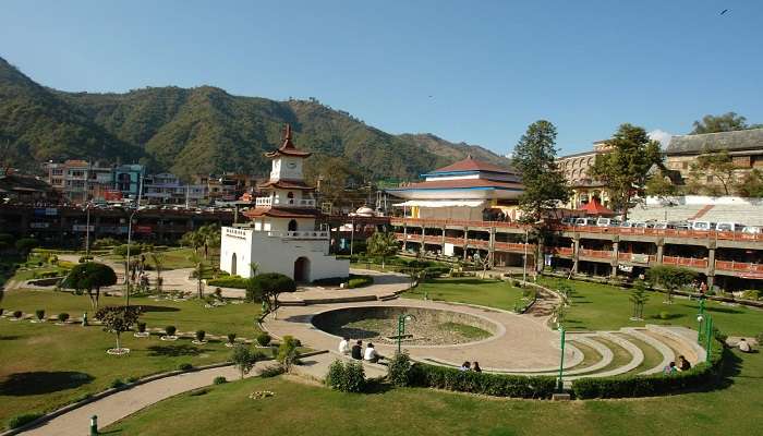 People visiting the Indira Tourist Park, with the picturesque mountain backdrop, and some others enjoying yak rides