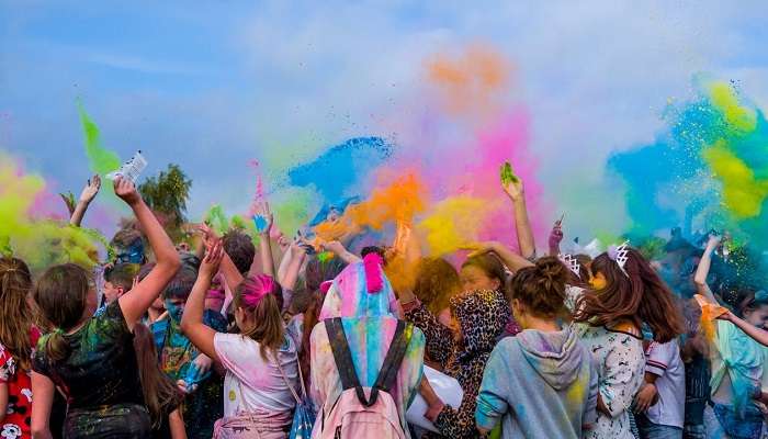 People playing with colours