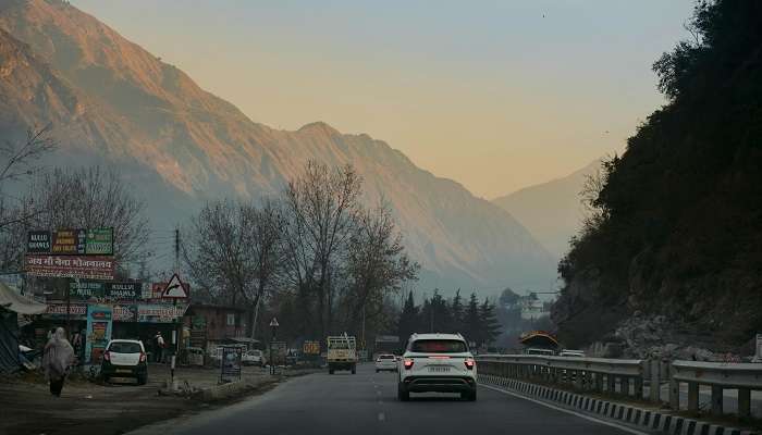 How do you reach Sangla by road or flight?