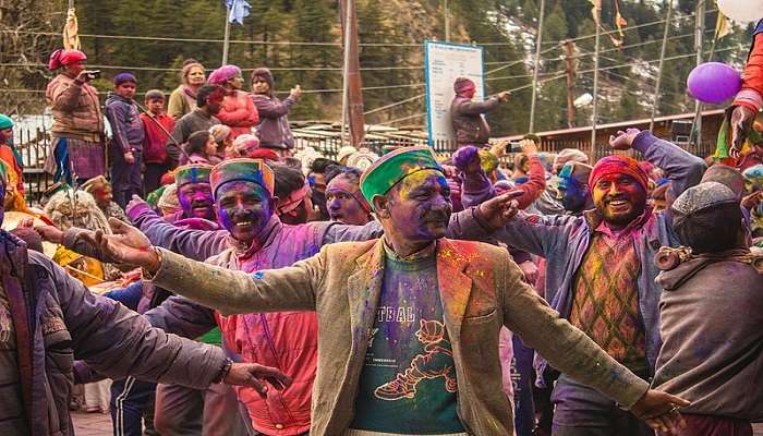 crowed street in Kasol during Holi