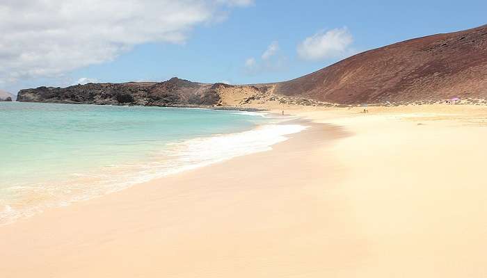 A majestic view of Playa de Las Conchas