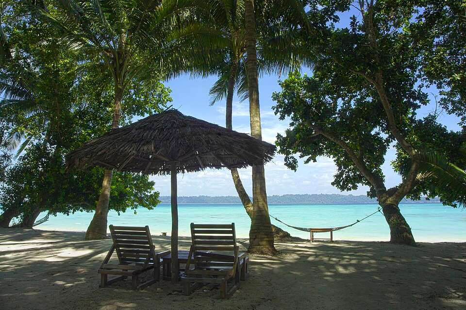 Chairs on shady beach, Anadman Isllands